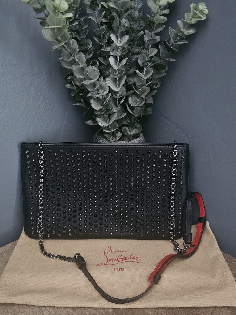 Christian Louboutin Black-Studded Leather Clutch With Red Trim Strap
